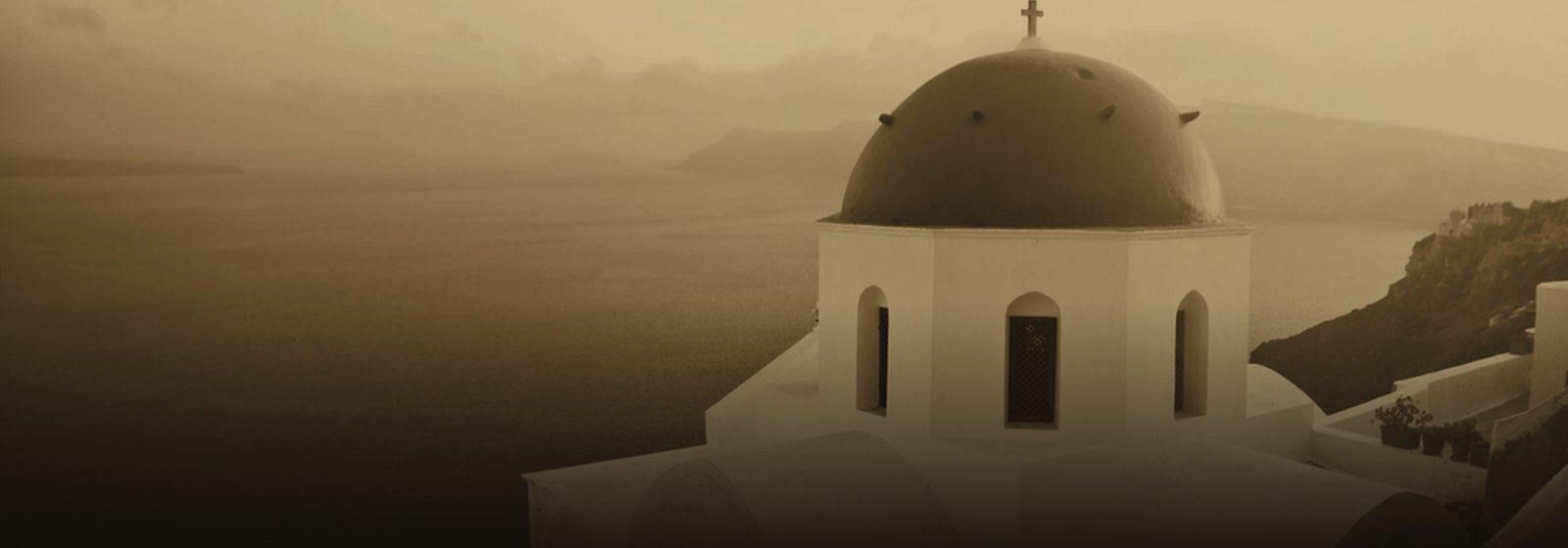 A church dome above the sea in Santorini, Greece